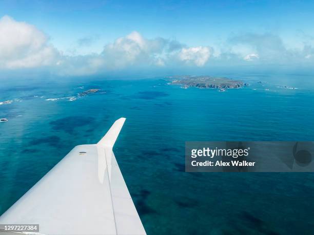 aerial view of alderney from light aircraft. - island of alderney photos et images de collection