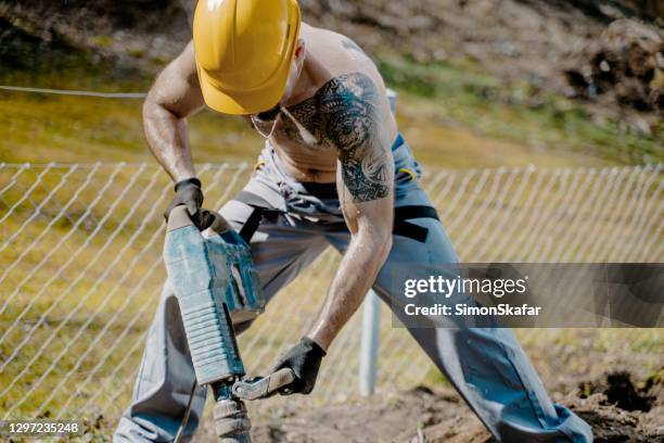 Man Using Hand Jack Man Using Jack Hammer Photos and Premium High Res Pictures - Getty Images