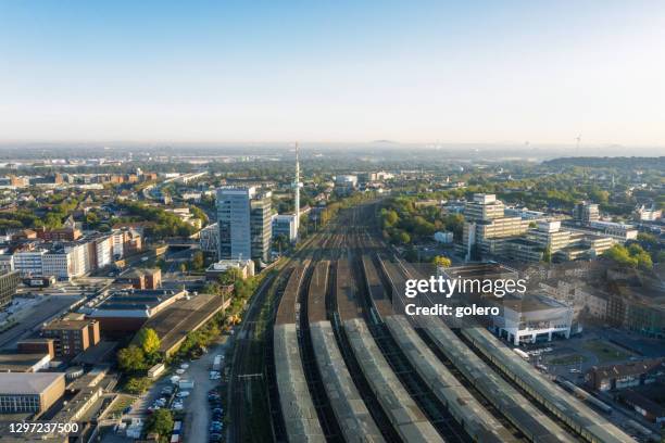 panoramic view over duisburg railroad station on city skyline - duisburg stock pictures, royalty-free photos & images