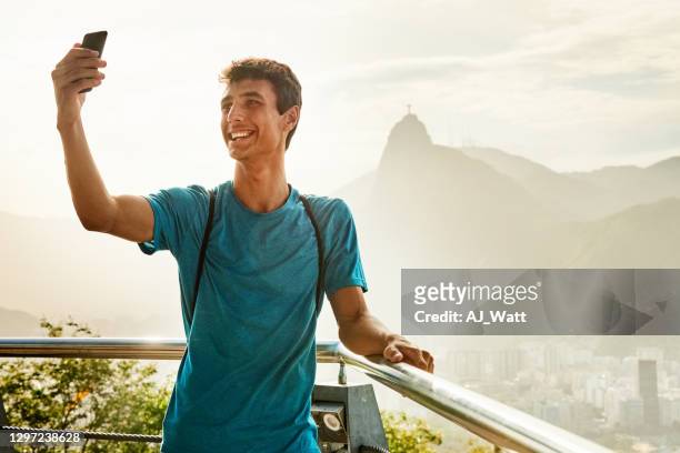 tourist taking selfie - rio de janeiro stock pictures, royalty-free photos & images