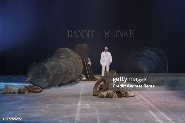 Designer Danny Reinke is seen on the runway after his show during the Mercedes-Benz Fashion Week Berlin January 2021 at Kraftwerk Mitte on January...