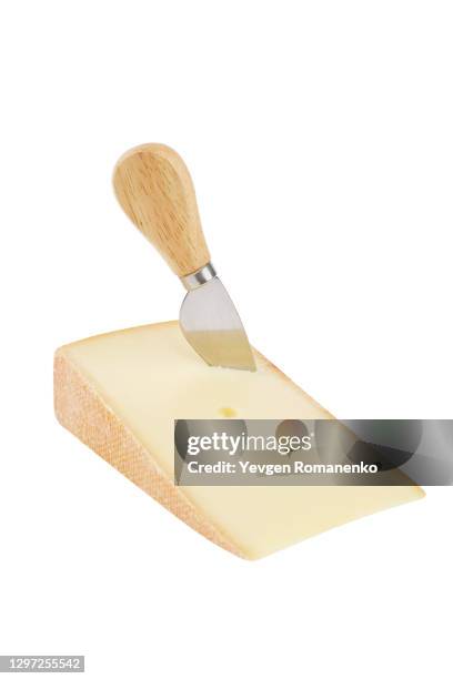 triangle cheese chunk with cheese knife isolated on white background - cheddar cheese stock pictures, royalty-free photos & images
