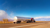 Fuel tanker driving on a single lane road USA