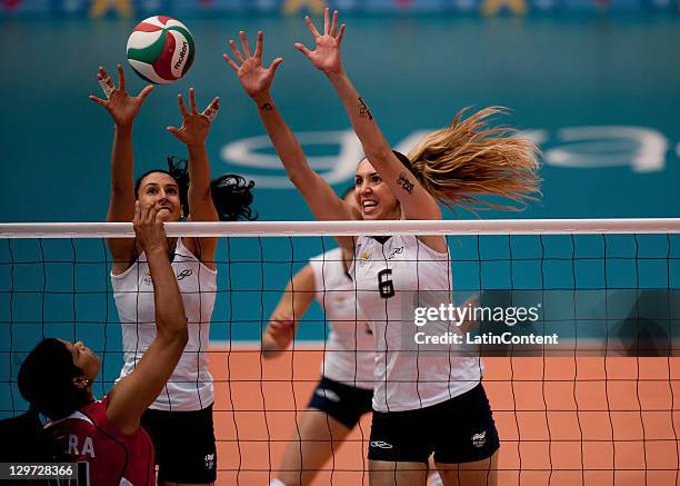 Prisilla River of Dominican Republic and Thaisa Menezes of the Brazil during the Women's Volleyball between Brazil and the Dominicana Republic as...