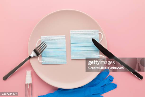 conceptual photo of the impact of covid-19 on the restaurant business. - ruined dinner stock pictures, royalty-free photos & images