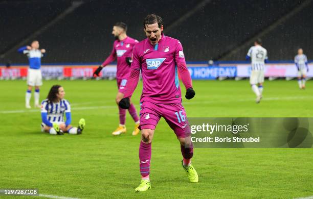 Sebastian Rudy of TSG Hoffenheim celebrates after scoring their sides first goal during the Bundesliga match between Hertha BSC and TSG Hoffenheim at...