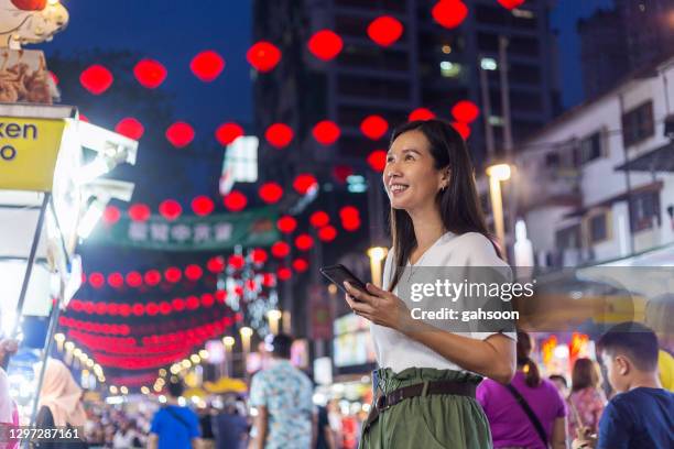 tourist visiting jalan alor bukit bintang kuala lumpur - bukit bintang stock pictures, royalty-free photos & images