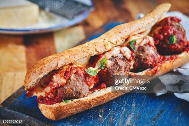 meatballs cheese sandwich with tomato sauce - meatball sandwich stock pictures, royalty-free photos & images