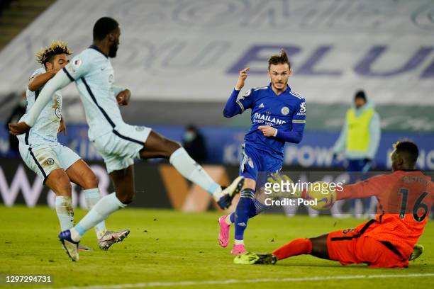 James Maddison of Leicester City scores their sides second goal past Edouard Mendy of Chelsea during the Premier League match between Leicester City...