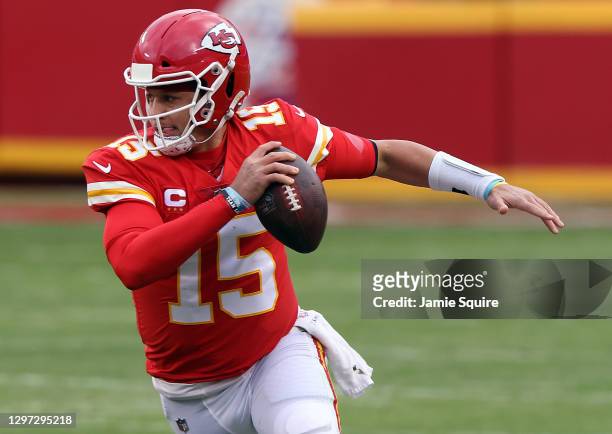 Quarterback Patrick Mahomes of the Kansas City Chiefs scrambles during the AFC Divisional Playoff game against the Cleveland Browns at Arrowhead...