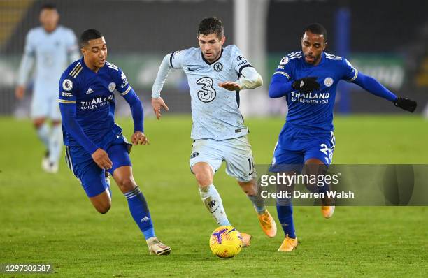 Christian Pulisic of Chelsea is challenged by Youri Tielemans and Ricardo Pereira of Leicester City during the Premier League match between Leicester...
