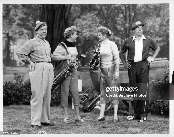 William Frawley, Vivian Vance, Lucille Ball, and Desi Arnaz out golfing in the television series 'I Love Lucy', 1951.