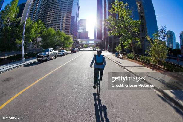 calgary alberta bicycle messenger - car back stock pictures, royalty-free photos & images