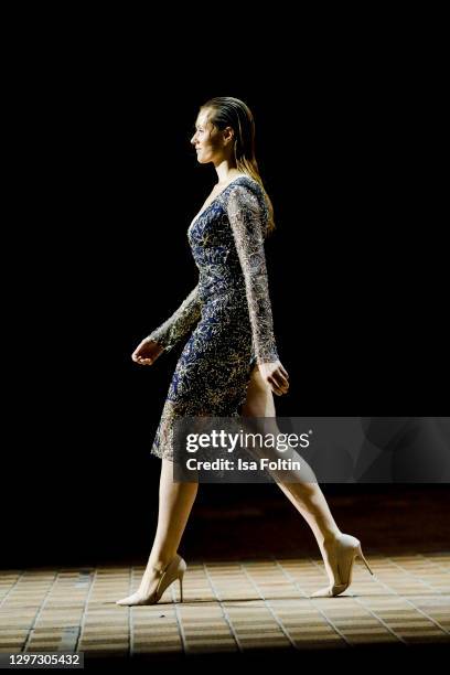 In this image released on January 19, German actress and musical singer Anna Hofbauer walks the runway at the Lana Mueller show during the...