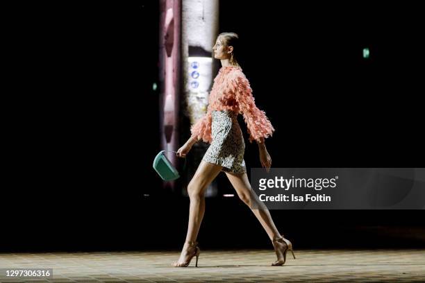 In this image released on January 19, model Trixie Giese walks the runway at the Lana Mueller show during the Mercedes-Benz Fashion Week Berlin...