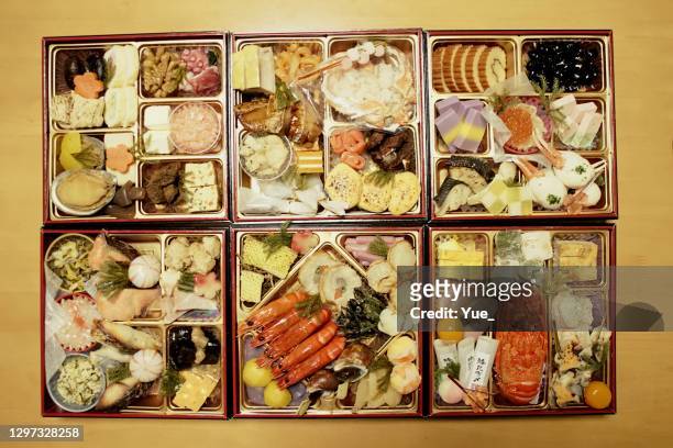 osechi - traditional japanese new year's dish - osechi ryori stock pictures, royalty-free photos & images
