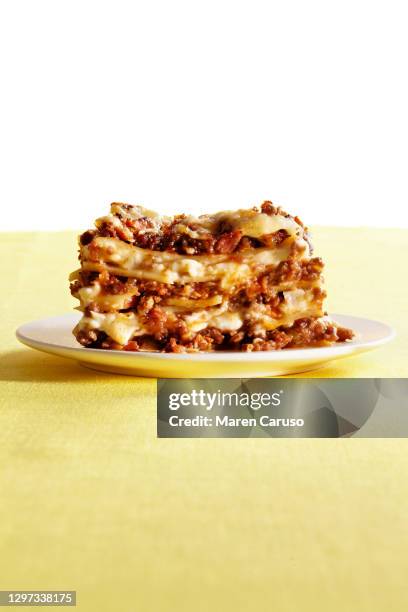 bolognese lasagna - serving lasagna stock pictures, royalty-free photos & images