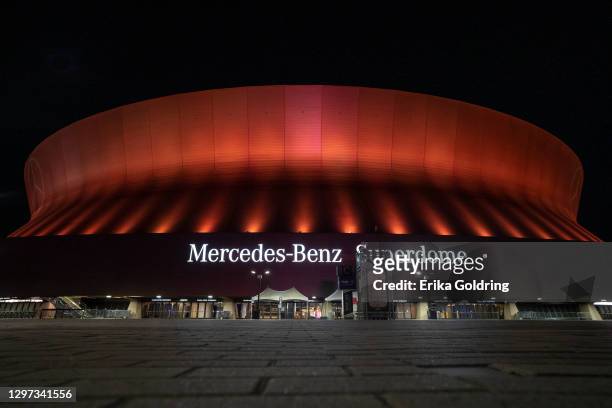 The Mercedes-Benz Superdome illuminates an amber hue light to support the Biden Inaugural Committee's COVID-19 Memorial: A National Moment of Unity...