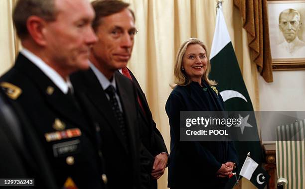 Secretary of State Hillary Clinton , awaits the arrival of Pakistan Prime Minister Youssaf Gilani for their meeting in Islamabad, on October 20...