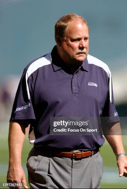 Head coach Mike Holmgren of the Seattle Seahawks looks on while his team warms up prior to the start of an NFL football game against the San...