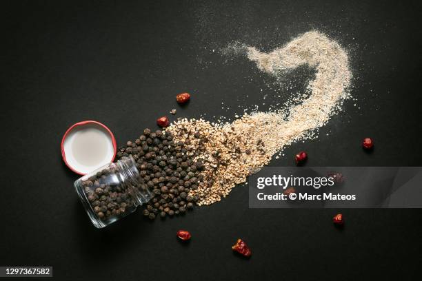 species forming a flame shape - pepper seasoning stock pictures, royalty-free photos & images