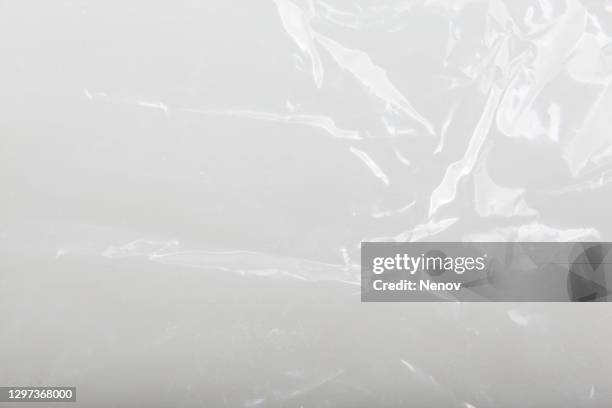 close-up of empty plastic bag background - scrunched plastic bag stock pictures, royalty-free photos & images