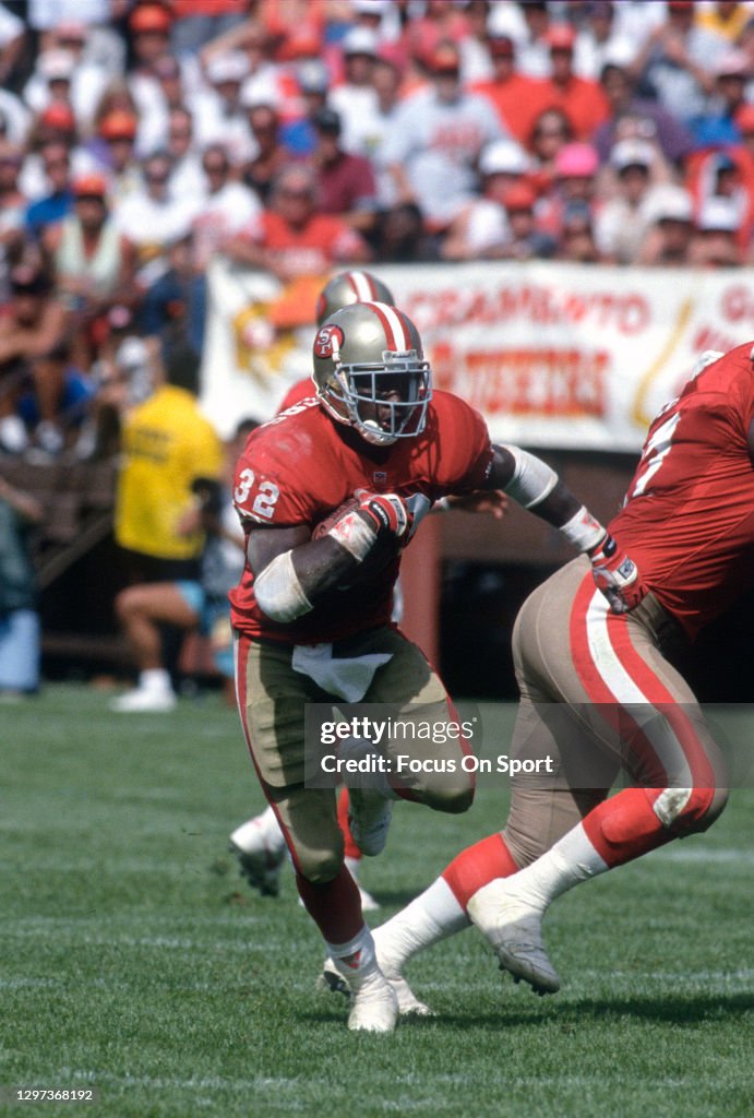 49ers Rookie Ricky Ricky Watters of the San Francisco 49ers carries the ball during an ...