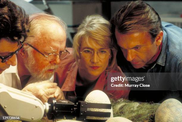 From left to right, actors Jeff Goldblum as Dr. Ian Malcolm, Richard Attenborough as John Hammond, Laura Dern as Dr. Ellie Sattler and Sam Neill as...