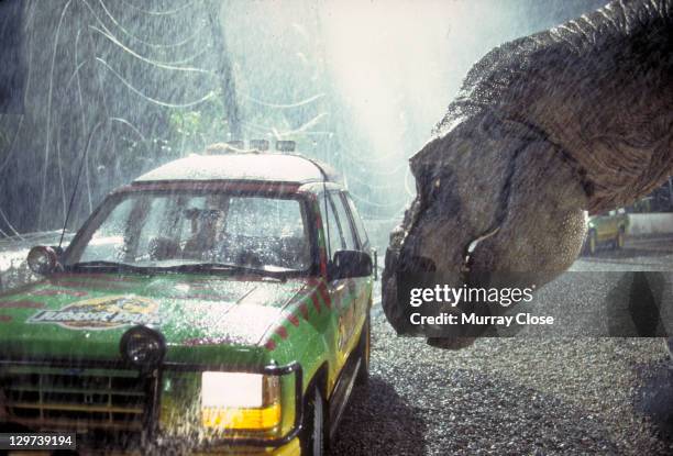 Tyrannosaurus Rex menaces the theme park's first customers in a scene from the film 'Jurassic Park', 1993.