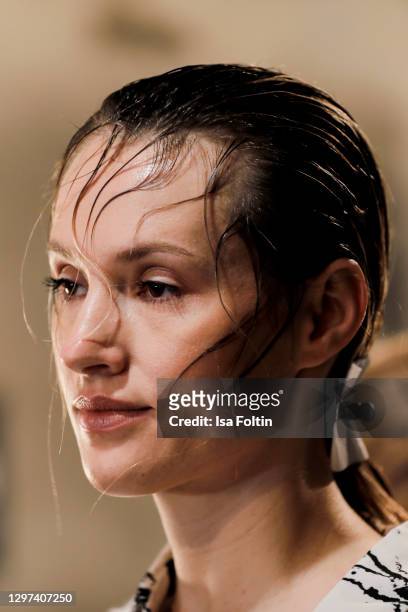 In this image released on January 19, German actress and musical singer Anna Hofbauer is seen backstage ahead of the Lana Mueller show during the...