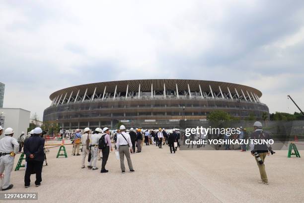 Stade où se dérouleront les cérémonies d'ouverture et de clôture des jeux olympiques de Tokyo 2020 en cours de travaux de finitions, le 3 juillet...