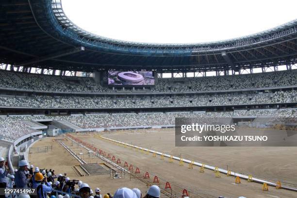 Stade où se dérouleront les cérémonies d'ouverture et de clôture des jeux olympiques de Tokyo 2020 en cours de travaux de finitions, le 3 juillet...