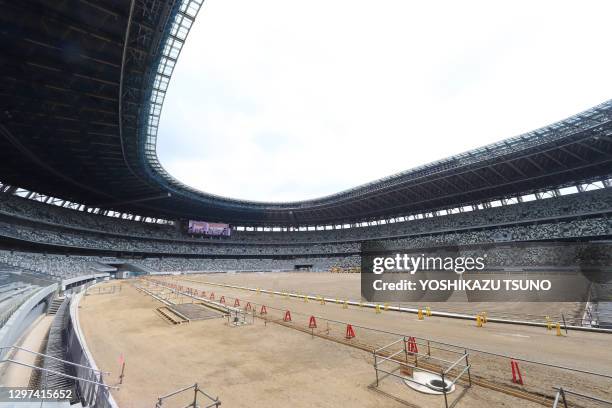 Stade où se dérouleront les cérémonies d'ouverture et de clôture des jeux olympiques de Tokyo 2020 en cours de travaux de finitions, le 3 juillet...