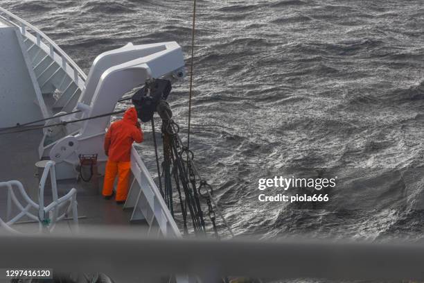 fishing industry in the north sea: fishermen at work - extreme weather norway stock pictures, royalty-free photos & images