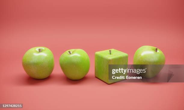 cube shaped apple - the weird apples stock pictures, royalty-free photos & images