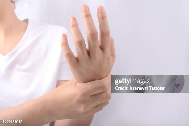 hand nerve pain,numbness in hands isolated on white background - muscle cramps stock pictures, royalty-free photos & images