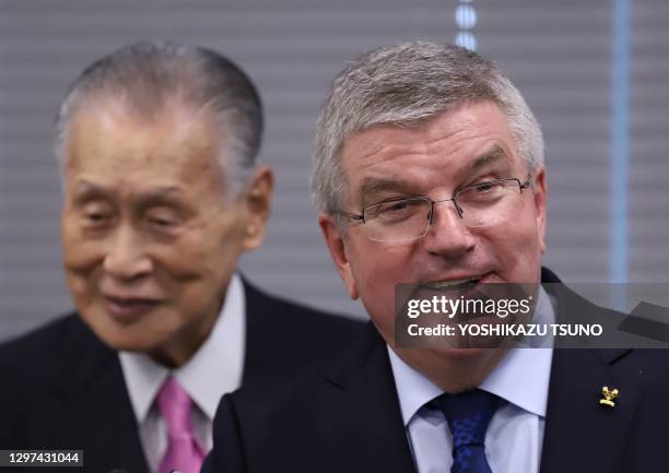 Portrait du président du Comité International Olympique Thomas Bach et du président du Comité d'organisation des jeux olympiques de "Tokyo 2020" et...