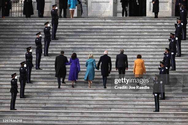 Doug Emhoff, U.S. Vice President-elect Kamala Harris, Jill Biden, President-elect Joe Biden, U.S. Sen. Roy Blunt and U.S. Sen. Amy Klobuchar walk...
