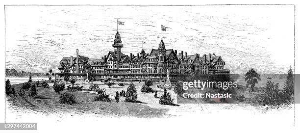 hotel del coronado ,built in 1888 by elisha babcock, jr., and hampton l. story and designated a national historic landmark in 1977, this historic beach resort is a famous san diego icon. - del coronado stock illustrations