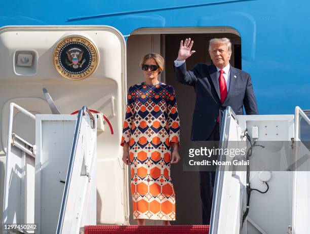 Outgoing U.S. President Donald Trump and First Lady Melania Trump exit Air Force One at the Palm Beach International Airport on the way to Mar-a-Lago...