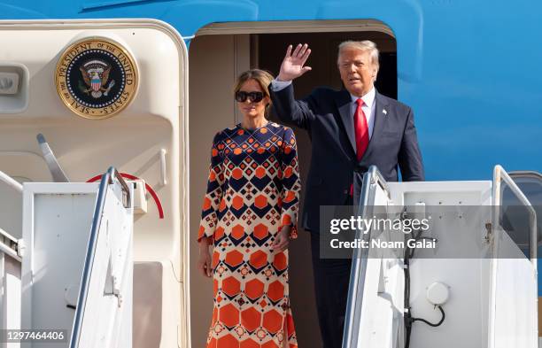 Outgoing U.S. President Donald Trump and First Lady Melania Trump exit Air Force One at the Palm Beach International Airport on the way to Mar-a-Lago...