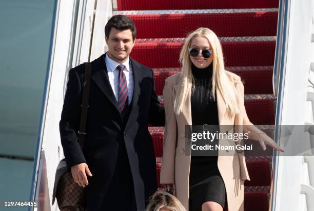 Tiffany Trump and Michale Boulos exit Air Force One at the Palm Beach International Airport on the way to Mar-a-Lago Club on January 20, 2020 in West...