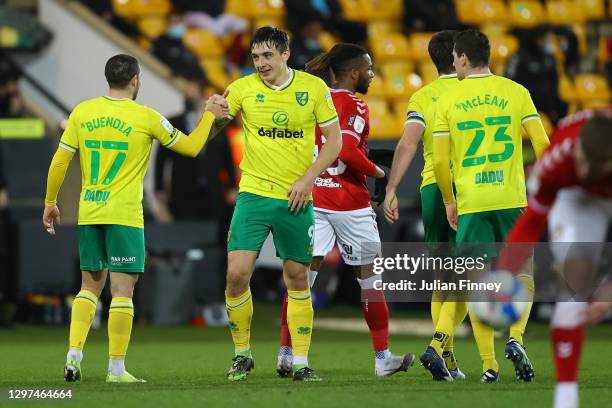 Jordan Hugill of Norwich City celebrates with team mate Emi Buendia after scoring their side's first goal during the Sky Bet Championship match...