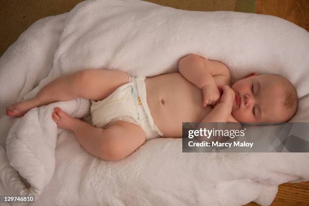 Baby Diaper Sleeping Photos And Premium High Res Pictures Getty Images baby-diaper-sleeping-photos-and-premium-high-res-pictures-getty-images