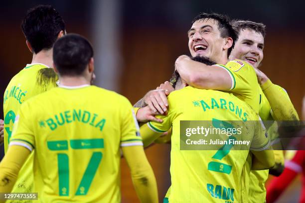 Jordan Hugill of Norwich City celebrates with team mate Max Aarons after scoring their side's second goal during the Sky Bet Championship match...