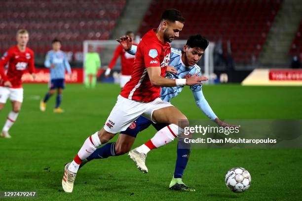 Pantelis Chatzidiakos of AZ Alkmaar tackles Edson Alvarez of Ajax during the KNVB Beker or Dutch Cup match between AZ Alkmaar and AFC Ajax Amsterdam...