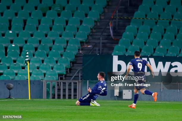 Santi Mina of Celta Vigo celebrates with team mate Nolito after scoring their sides first goal during the La Liga Santander match between Real Betis...