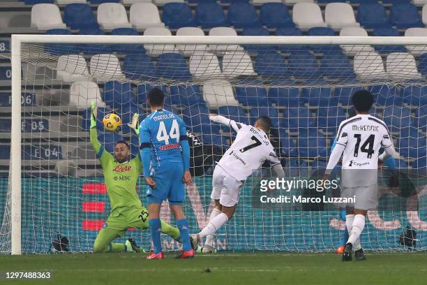 Cristiano Ronaldo of Juventus scores their sides first goal during the Italian PS5 Supercup match between Juventus and SSC Napoli at Mapei Stadium -...