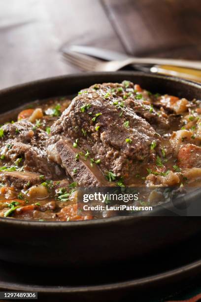 braised beef short ribs in a rich red wine gravy - stew stock pictures, royalty-free photos & images
