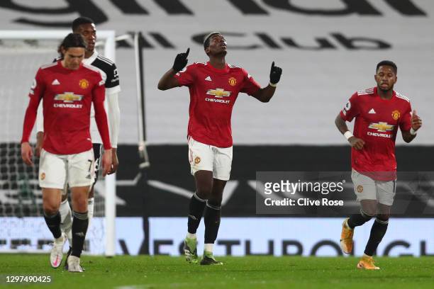 Paul Pogba of Manchester United celebrates after scoring their side's second goal during the Premier League match between Fulham and Manchester...